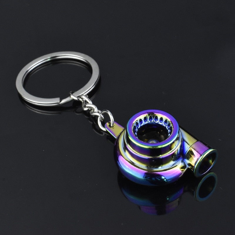 VmG-Store keychain in a form of an electric turbo charger, with